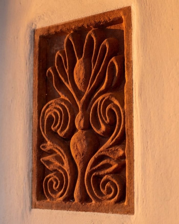 Carved detail on a hotel wall