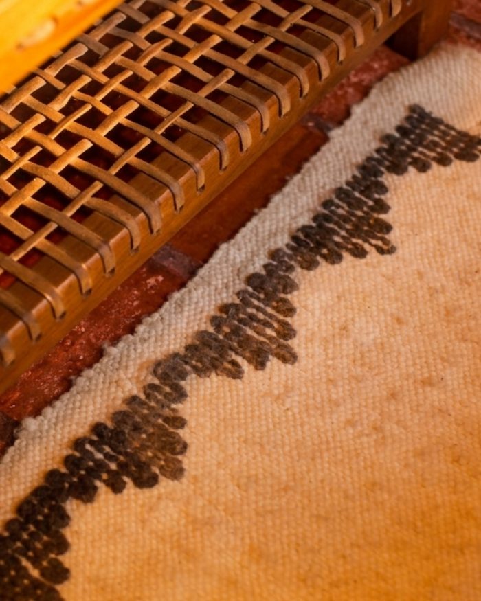 Woven chair and handmade rug