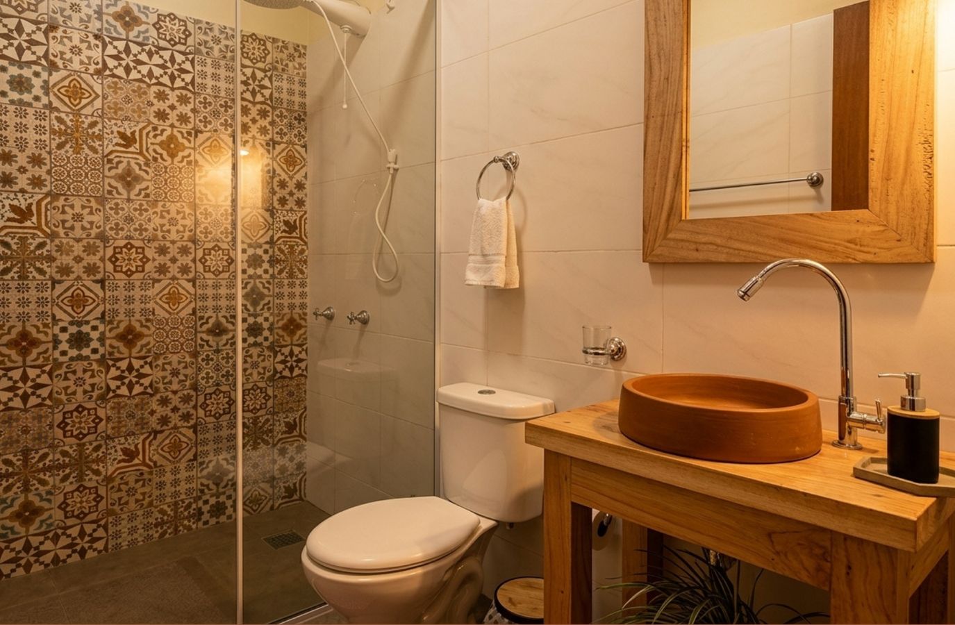 Private bathroom with wooden sink