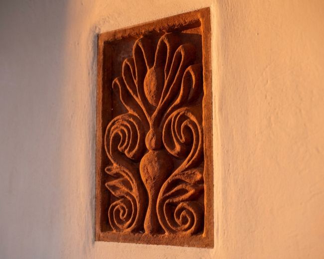 Carved detail on the wall