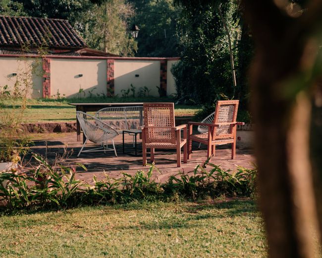 Outdoor lounge with wicker armchairs
