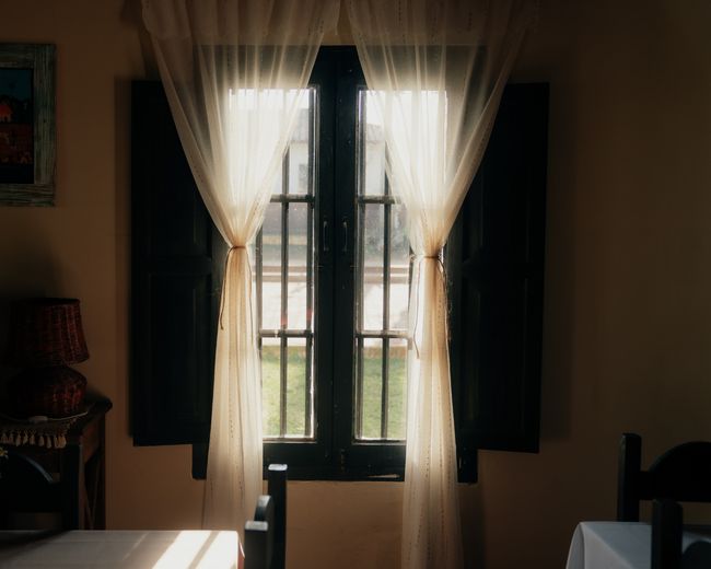 Window with curtains in the dining room